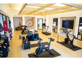 Exercise equipment and apparel for sale at the Peloton showroom in Dedham, Massachusetts, U.S., on Wednesday, Feb. 3, 2021. Peloton Interactive Inc. is scheduled to release earnings figures on February 4.