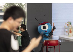 The Ant Group Co. mascot at the company's headquarters in Hangzhou, China, on Monday, Aug. 2, 2021. Alibaba Group Holding Ltd., which holds a 33% stake in Ant, is scheduled to report first-quarter results on Aug. 3. Photographer: Qilai Shen/Bloomberg