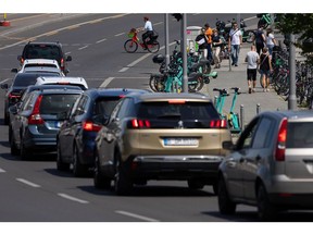 Motorists wait in traffic at a junction in Berlin, Germany, on Friday, June 17, 2022. Germany's Economy Minister Robert Habeck plans to tighten the country's cartel law after tax cuts failed to bring about the intended price reductions at fuel pumps.