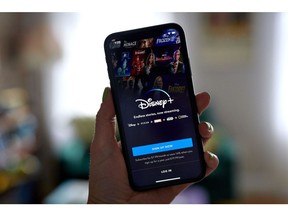 The Disney+ website on a smartphone in the Brooklyn borough of New York, US, on Monday, July 18, 2022. Walt Disney Co.'s ESPN will raise the price of its streaming service by 43% next month, betting that it can help cover the escalating cost of sports rights without losing subscribers who are grappling with soaring inflation. Photographer: Gabby Jones/Bloomberg