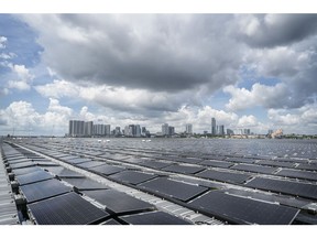 The floating solar photovoltaic power plant by EDPR Sunseap Group, a unit of Energias de Portugal SA, in Woodlands, in Singapore, on Wednesday, Dec. 7, 2022. EDPR Sunseap has built a floating solar farm in the sea off Singapore that supplies power to its customer Meta Platforms Inc. via the national grid. Senior officials say the facility is part of the company's plan to expand in Singapore and Vietnam.
