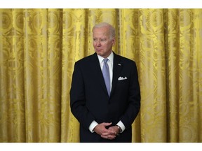 WASHINGTON, DC - JANUARY 20: U.S. President Joe Biden listens as he hosts mayors from across the country during an event at the East Room of the White House on January 20, 2023 in Washington, DC. President Biden hosted mayors who are attending the U.S. Conference of Mayors Winter Meeting at the White House to discuss bipartisan achievements.