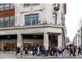 Shoppers outside the Marks & Spencer store on Oxford Street in central London Photographer: Betty Laura Zapata/Bloomberg