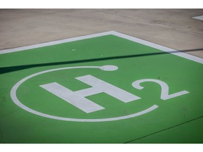 A H2 logo at a green hydrogen refuelling station for Transporte Metropolitano de Barcelona (TMB) city buses, operated by Iberdrola SA, in Barcelona, Spain, on Monday, April 24, 2023. A new 16.3 billion euro green energy plan, partly financed by European Union recovery funds, aims to develop green hydrogen projects, increase renewable power capacity and build new storage facilities. Photographer: Angel Garcia/Bloomberg