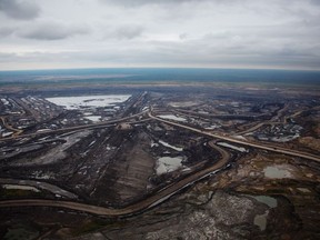 The Suncor Energy Inc. Millennium mine is seen in this aerial photograph taken above the Athabasca oilsands near Fort McMurray.