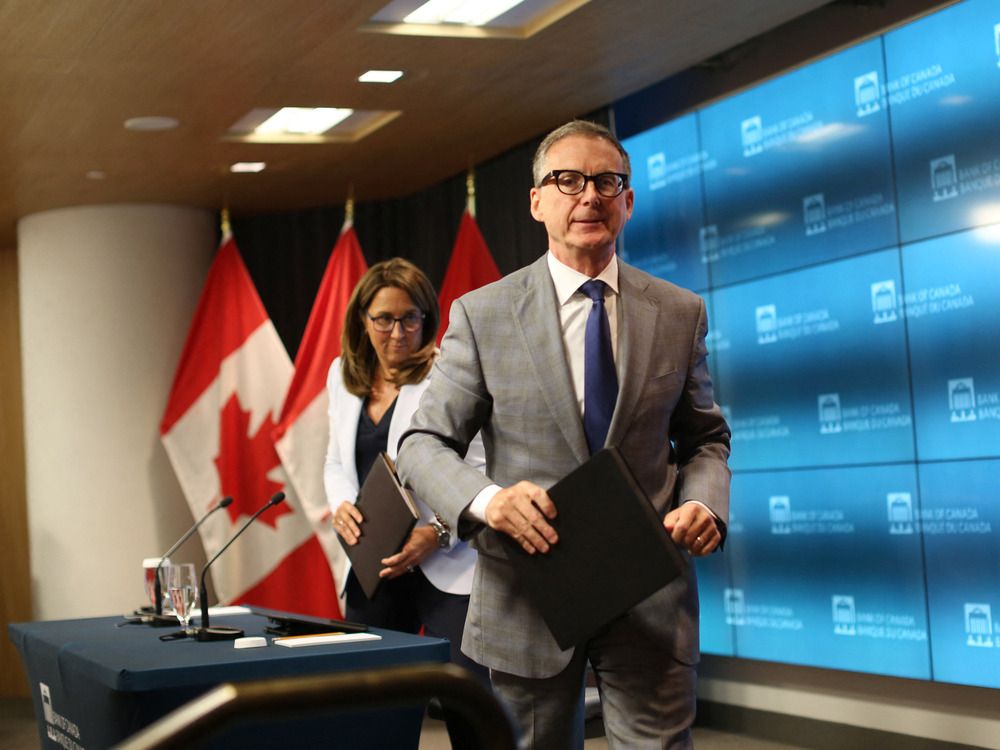 Bank of Canada governor Tiff Macklem, and senior deputy governor Carolyn Rogers, leaving a news conference on July 12.