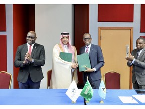(holding the agreement from left to right): The Saudi Fund for Development (SFD) Chief Executive Officer, H.E. Sultan Al-Marshad, and the Prime Minister of Saint Lucia, Hon. Philip Joseph Pierre