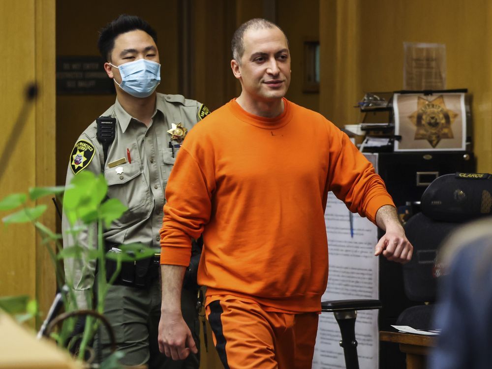 FILE - Nima Momeni, the man charged in the fatal stabbing of Cash App founder Bob Lee, makes his way into the courtroom for his arraignment in San Francisco on May 2, 2023. A San Francisco judge on Tuesday, Aug. 1, 2023, ordered Momeni to stand trial for murder in the stabbing death of Cash App founder Bob Lee. Lee's death in April shocked the tech community as fellow executives and engineers praised his generosity, curiosity and leadership skills. He was 43 and left behind two children.