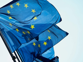European Union flags fly outside the EU commission headquarters