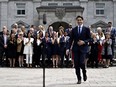 Members of the federal cabinet as Prime Minister Justin Trudeau arrives for a media availability after a cabinet shuffle at Rideau Hall in Ottawa.