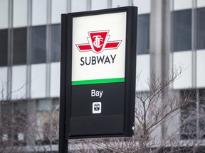 A TTC subway pedestrian entrance on Bay Street in Yorkville, Toronto.