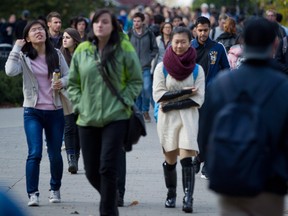 University of British Columbia students walk on the campus in Vancouver.