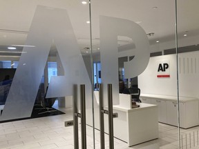 FILE - The Associated Press logo is shown at the entrance to the news organization's office in New York on Thursday, July 13, 2023. The Associated Press has issued guidelines for its journalists on use of artificial intelligence, saying the tool cannot be used to create publishable content and images for the news service.