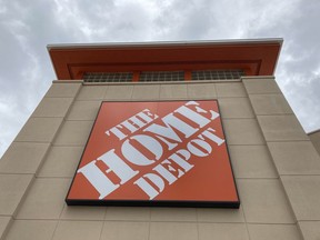 FILE - A Home Depot logo is shown on a store on May 14, 2021, in North Miami, Fla. Home Depot reports earnings on Tuesday.