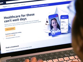 A page from Amazon's clinic site is shown on a laptop in New York on Tuesday, Aug. 1, 2023. Amazon is adding video telemedicine visits in all 50 states to the virtual clinic it launched last fall, as the e-commerce giant pushes deeper into care delivery.