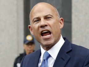 FILE - Michael Avenatti makes a statement to the press as he leaves federal court in New York, July 23, 2019. A federal appeals court on Wednesday, Aug. 30, 2023, upheld Avenatti's conviction for plotting to extort up to $25-million from shoe giant Nike – one of several legal messes that have landed him behind bars.