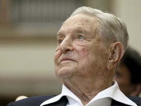 FILE - George Soros, founder and chairman of the Open Society Foundations, attends the Joseph A. Schumpeter award ceremony, June 21, 2019, in Vienna, Austria. Open Society Foundations plan to significantly curtail their work in Europe and lay off much of their staff on the continent, the foundations' leaders told staff in Berlin, according to an internal email and several current employees, who say the decision is painful and perplexing.