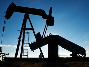 A pump jack operates in an oil field near Corpus Christi, Texas.