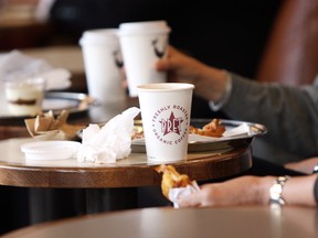 Customers eat and drink at a Pret A Manger restaurant in London, U.K.