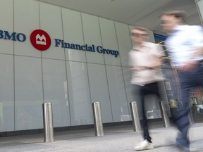 BMO Financial Group reported its third-quarter profit edged higher compared with a year ago even as the amount it set aside for bad loans grew. A Bank of Montreal branch is shown in Toronto, Monday, Aug. 14, 2023.