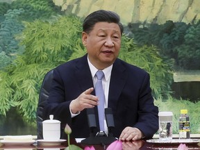 FILE - Chinese President Xi Jinping gestures as he meets with U.S. Secretary of State Antony Blinken in the Great Hall of the People in Beijing, China, on June 19, 2023. Xi will attend next week's summit of the BRICS nations in Johannesburg, to be followed by a state visit to South Africa, the Foreign Ministry said Friday, AUg. 18, 2023.