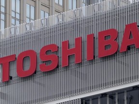 FILE - The logo of Toshiba Corp. is seen at a company's building in Kawasaki near Tokyo, on Feb. 19, 2022. Toshiba announced a 2 trillion yen ($14 billion) tender offer on Monday, Aug. 7, 2023, in a move that will take it private, as the scandal-tarnished Japanese electronics and energy giant seeks to turn itself around.