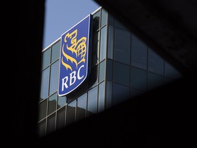 Royal Bank of Canada says its third-quarter profit rose compared with a year ago, helped higher by strength in its personal and commercial banking and insurance operations. The RBC Royal Bank of Canada logo is seen in Halifax on Tuesday, April 2, 2019.