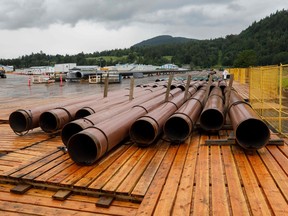 Pieces of the Trans Mountain pipeline project in a storage lot outside of Abbotsford, B.C., in 2021.