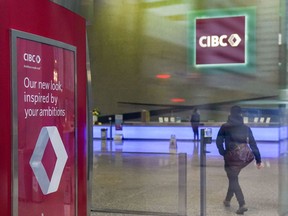 CIBC reported its third-quarter profit fell more than 10 per cent compared with a year ago as the amount it set aside for bad loans in the quarter tripled. The new CIBC logo displayed the the lobby of its headquarters in Toronto on Monday, Oct. 25, 2021.