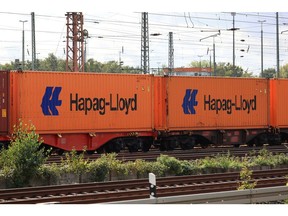 Containers operated by Hapag-Lloyd AG on a freight train at a rail depot in Seelze, Germany, on Tuesday, Sept. 20, 2022. German Transport Minister Volker Wissing said some freight railways are reporting a 1,000% increase in electricity costs and are now considering running diesel locomotives again. Photographer: Krisztian Bocsi/Bloomberg