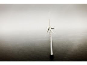 Offshore wind turbines at the Middelgrunden wind farm off the coast of Copenhagen, Denmark, on Thursday, Jan. 26, 2023. The wind farm off the coast of Denmark gives tour groups the rare opportunity to actually climb a turbine.