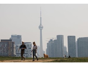 Smoke from wildfires in Toronto on June 7, 2023. Wildfires continue to burn large tracts of forest in Canada, with little sign weather will provide much help to firefighters who are battling the blazes.