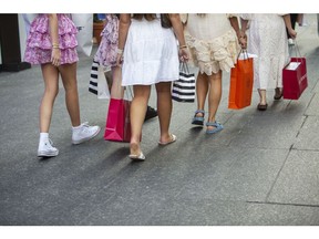 Shoppers in Toronto, Ontario. Photographer: Della Rollins/Bloomberg