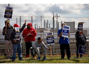 United Auto Workers (UAW) members on a picket line outside the Stellantis NV Toledo Assembly Complex in Toldeo, Ohio, US, on Monday, Sept. 18, 2023. The United Auto Workers began a strike Friday against all three of the legacy Detroit carmakers, an unprecedented move that could launch a costly and protracted showdown over wages and job security.