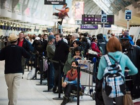Passengers line-up during flight delays and cancellations at Toronto's Pearson International Airport. The backlog of air passenger complaints at Canada’s transport regulator has hit a new high.