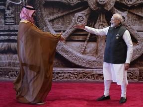 Indian Prime Minister Narendra Modi, right, welcomes Crown Prince Mohammed bin Salman of Saudi Arabia upon his arrival at Bharat Mandapam convention centre for the G20 Summit in New Delhi, India, Saturday, Sept. 9, 2023.