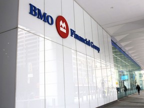 Bank of Montreal signage in Toronto's financial district. The bank will close its retail auto finance business.