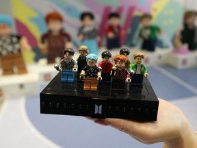 FILE - A LEGO set made of its blocks featuring K-pop band BTS, is shown during a publicity event at a store in Seoul, South Korea, on March 2, 2023. Danish toymaker Lego said Monday Sept. 25, 2023 that an experiment to make its colorful building bricks out of recycled drinks bottles didn't work but the world's largest toymaker "remains committed" to its plans to find sustainable materials to reduce carbon emission.