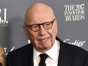 FILE - Rupert Murdoch attends the WSJ. Magazine 2017 Innovator Awards at The Museum of Modern Art in New York on Nov. 1, 2017. The media magnate is stepping down as chairman of News Corp. and Fox Corp., the companies that he built into forces over the last 50 years. He will become chairman emeritus of both corporations, the company announced on Thursday. His son, Lachlan, will control both companies.