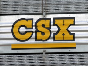 FILE - The CSX logo is seen, July 15, 2013, Nashville, Tenn. A railroad worker was crushed to death between two railcars early Sunday, Sept. 17, 2023, by a remote-controlled train in a CSX railyard in Ohio, raising concerns among unions about such technology.
