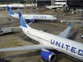 FILE - A United Airlines plane is pushed from the gate at George Bush Intercontinental Airport, Aug. 11, 2023, in Houston. United Airlines flights were halted nationwide on Tuesday, Sept. 5, because of an "equipment outage," according to the Federal Aviation Administration.