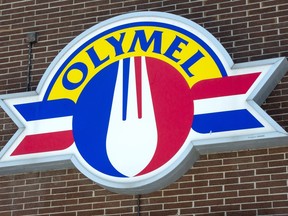 An Olymel sign is shown in Montreal on Tuesday, March 24, 2020, in Montreal. Olymel is closing two plants in Quebec and Ontario and accelerating the closure of another, affecting around 400 employees as the company says it's still facing market challenges.THE CANADIAN PRESS/Ryan Remiorz