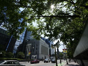 The Bank of Canada was watching its words at its last interest rate announcement as it was wary of spurring speculation about rate cuts coming any time soon. The Bank of Canada building is seen in Ottawa on Tuesday, July 11, 2023.