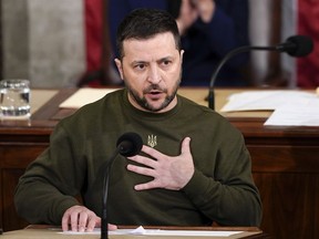 FILE - Ukrainian President Volodymyr Zelenskyy addresses a joint meeting of Congress on Capitol Hill in Washington, Dec. 21, 2022. Ukraine hosted an international defense industry conference as part of a government effort to ramp up weapons production within the country to repel Russia's full-scale invasion and reduce foreign dependence on arms deliveries.