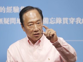FILE - Chief Executive Officer of Hon Hai Precision Industry (Foxconn) Terry Gou answers to audience members during a media event announcing his new book ''30 memos written by Father Guo to young people'' in Taipei, Taiwan, Tuesday, Aug. 8, 2023. Aspiring Taiwanese independent presidential candidate Terry Gou has resigned from the board of Foxconn, the Apple supplier he founded nearly a half-century ago.