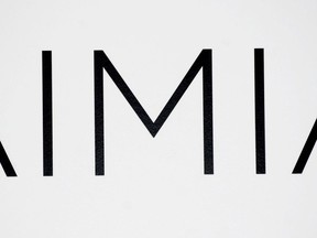 The largest shareholder of Aimia Inc. has made a bid to take the company private in a deal that values the company at about $308 million, saying it has become disillusioned and frustrated by the actions of the company's board and management team. An AIMIA logo is shown at the company's annual general meeting in Montreal, Friday, May 4, 2012.