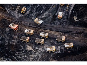 Heavy haulers at an oil sands mine near Fort McMurray, Alberta.