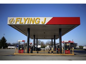 Fuel pumps are pictured at a Pilot Travel Centers LLC Flying J gas station in Waddy, Kentucky, U.S., on Wednesday, March 25, 2020. U.S. natural gas futures slipped after last week's storage decline matched forecasts, while traders weighed the magnitude of potential drops in demand and supply amid the coronavirus outbreak.