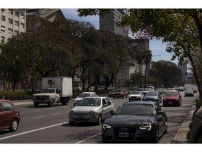 Traffic moves through 9 de Julio Avenue in Buenos Aires, Argentina, on Thursday, Sept. 17, 2020.
