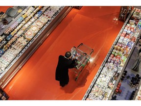 A shopper at a grocery store. Photographer: Cole Burston/Bloomberg